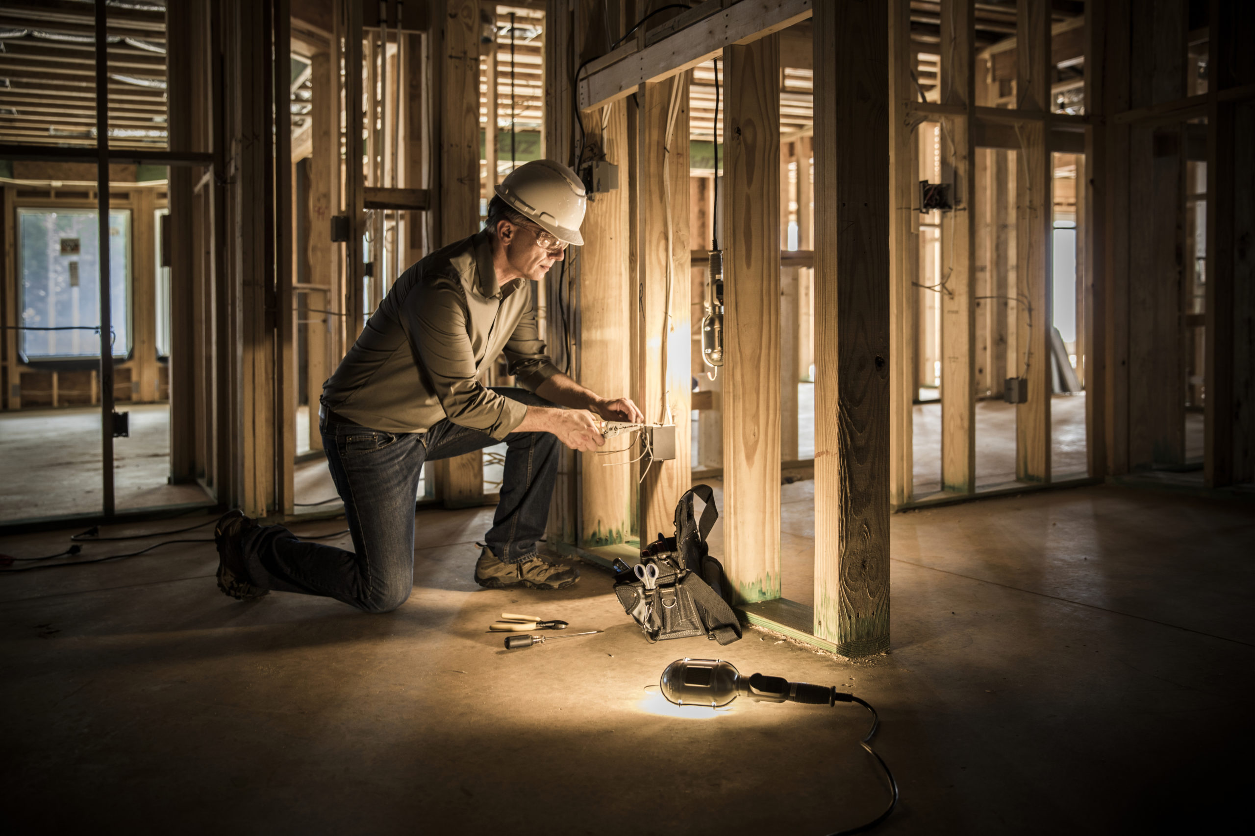 Electrician at home construction site.